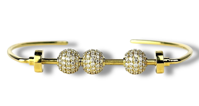 The Abacus in 18K gold with diamonds